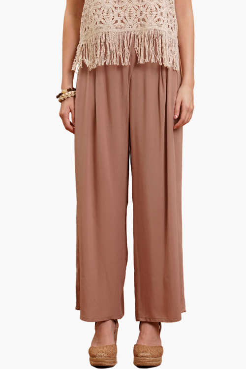 PANTALONE CON ABBOTTONATURA ASIMMETRICA